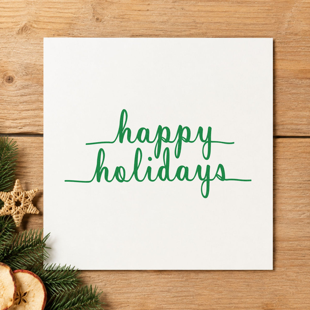 Happy Holidays Underlined Script craft stamp imprint in green ink on a handmade project, one idea being formal dinner menus.
