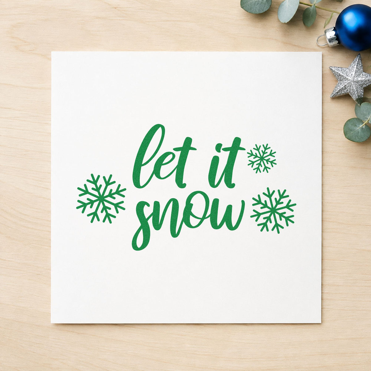Let It Snow Three Snowflakes craft stamp imprint in green ink on a handmade project, one idea being guild meeting cards.