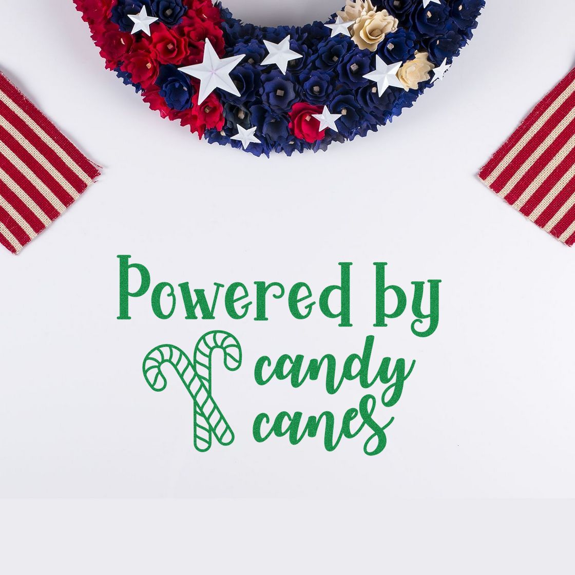 Powered by candy canes rubber stamp design for Christmas crafts, featuring a candy cane icon and festive lettering.