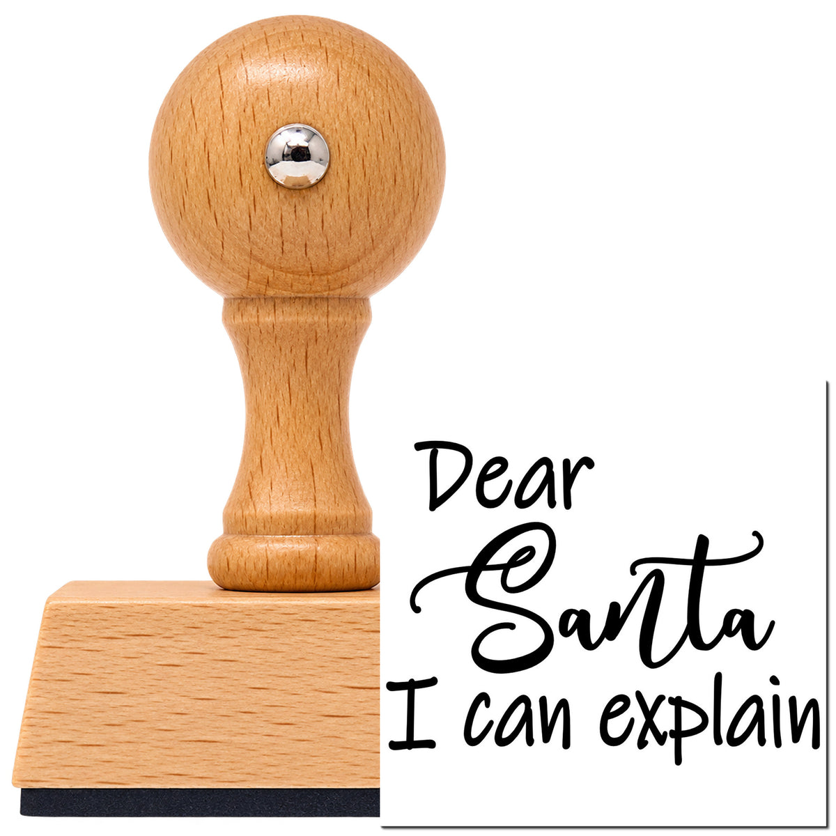 Dear Santa I Can Explain Script Vintage Pro rubber stamp in European beech wood with a round knob handle, shown beside its black imprint.