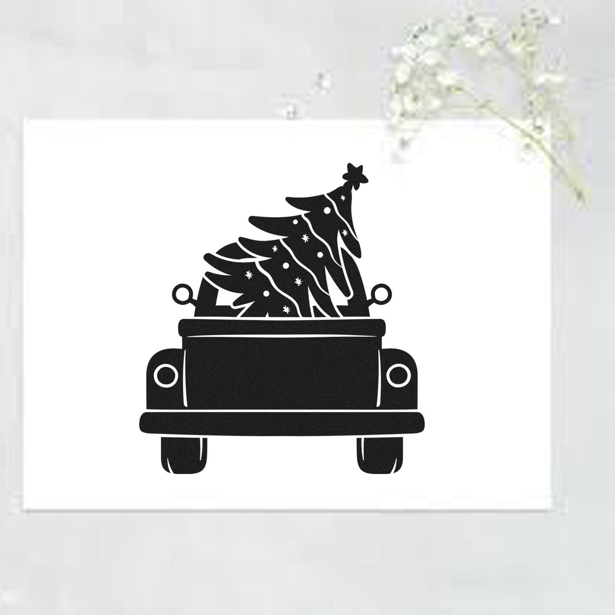 Pickup Truck Christmas Tree With Stars Pre-Inked Stamp – Slim imprint stamped in black ink. A rear-view pickup truck carries a decorated Christmas tree topped with a star.