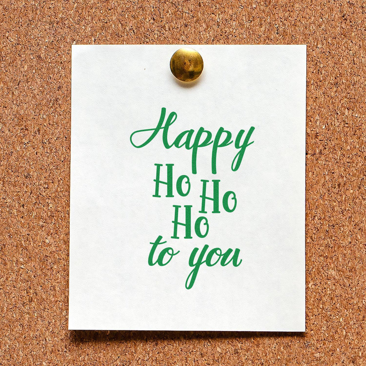 Happy Ho Ho Ho To You rubber stamp shown in green ink, stamped for projects such as column album panel.