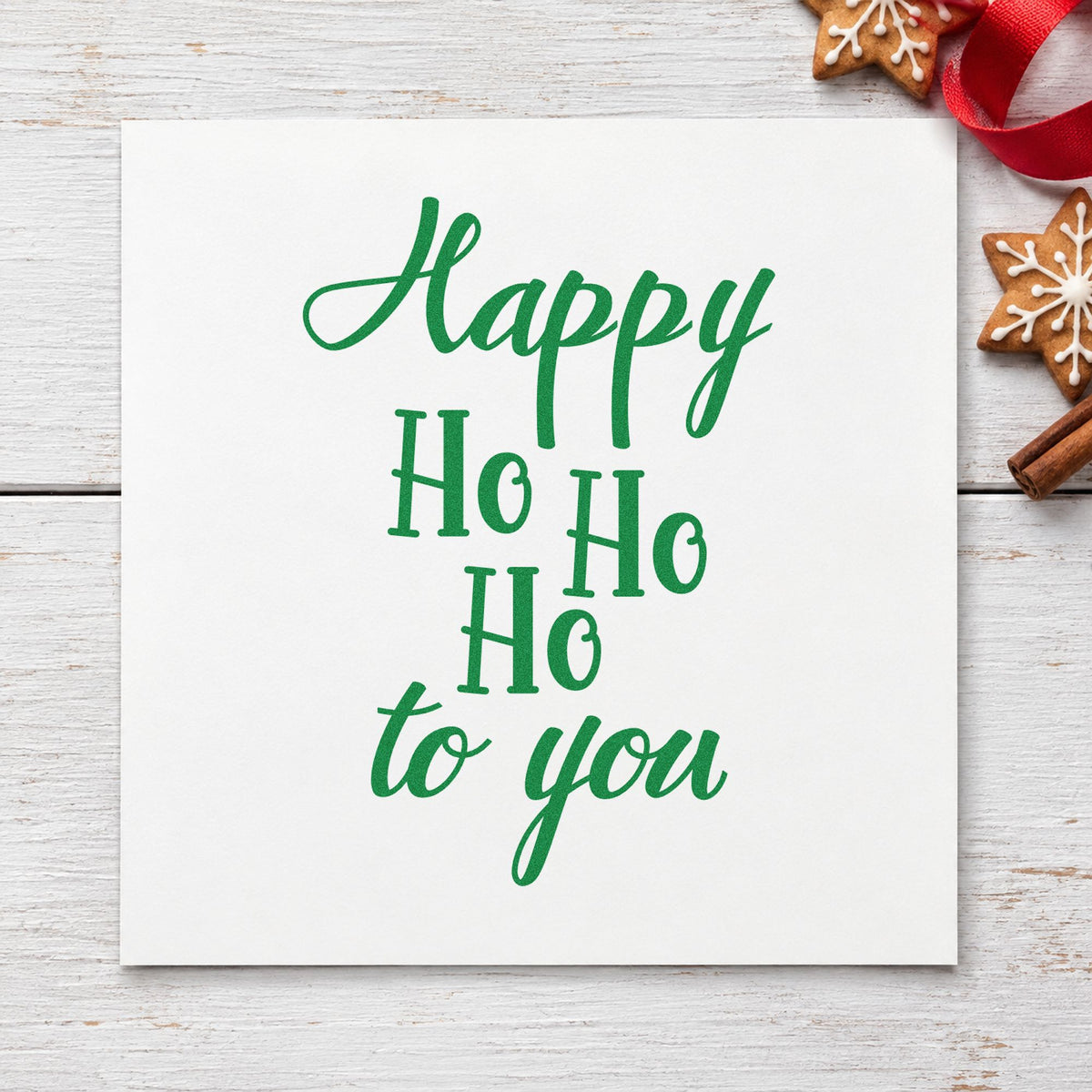 Happy Ho Ho Ho To You craft stamp imprinted in green ink on paper, a design suited to framed upright print.