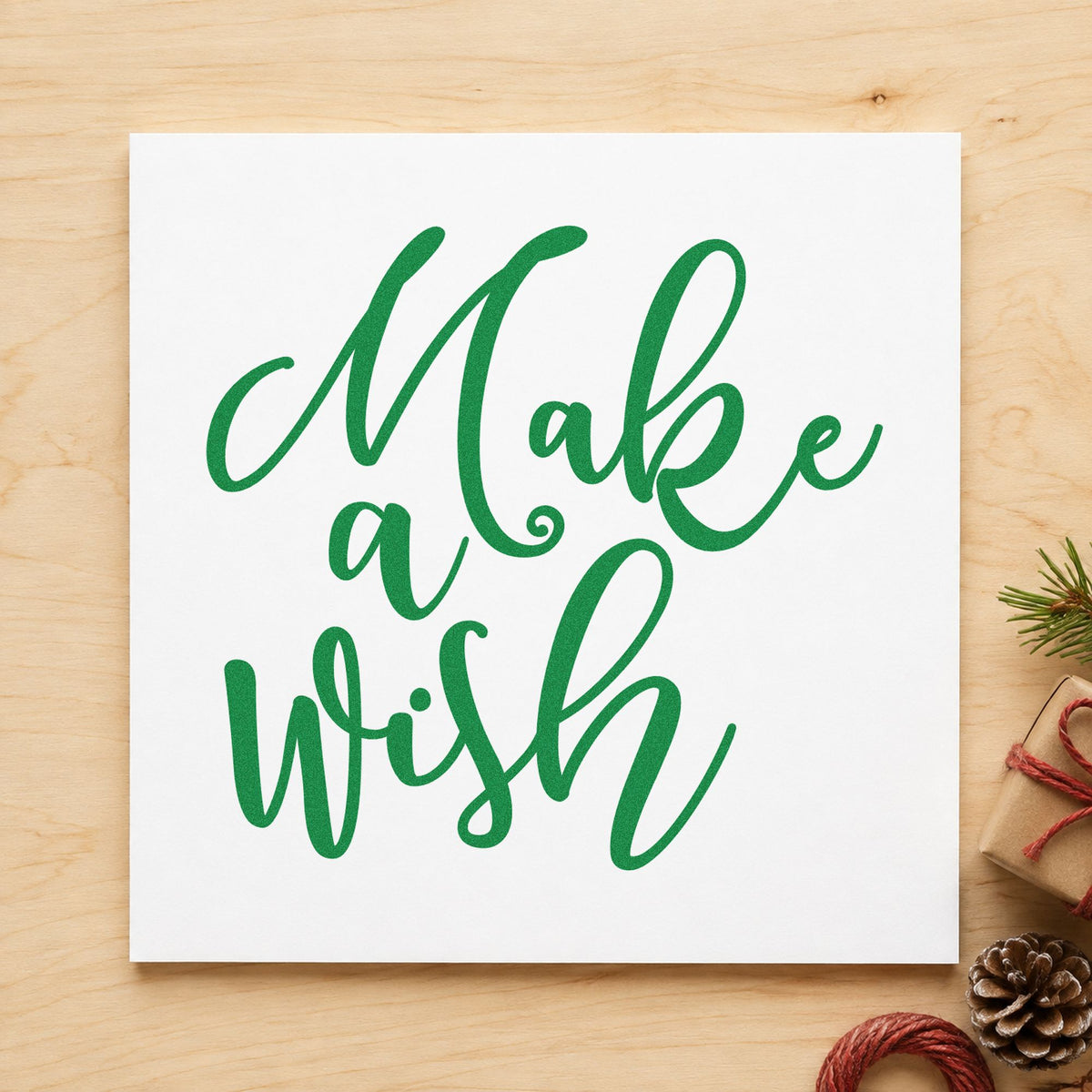 Make A Wish Script craft stamp imprint in green ink on a handmade project, one idea being candle count placards.