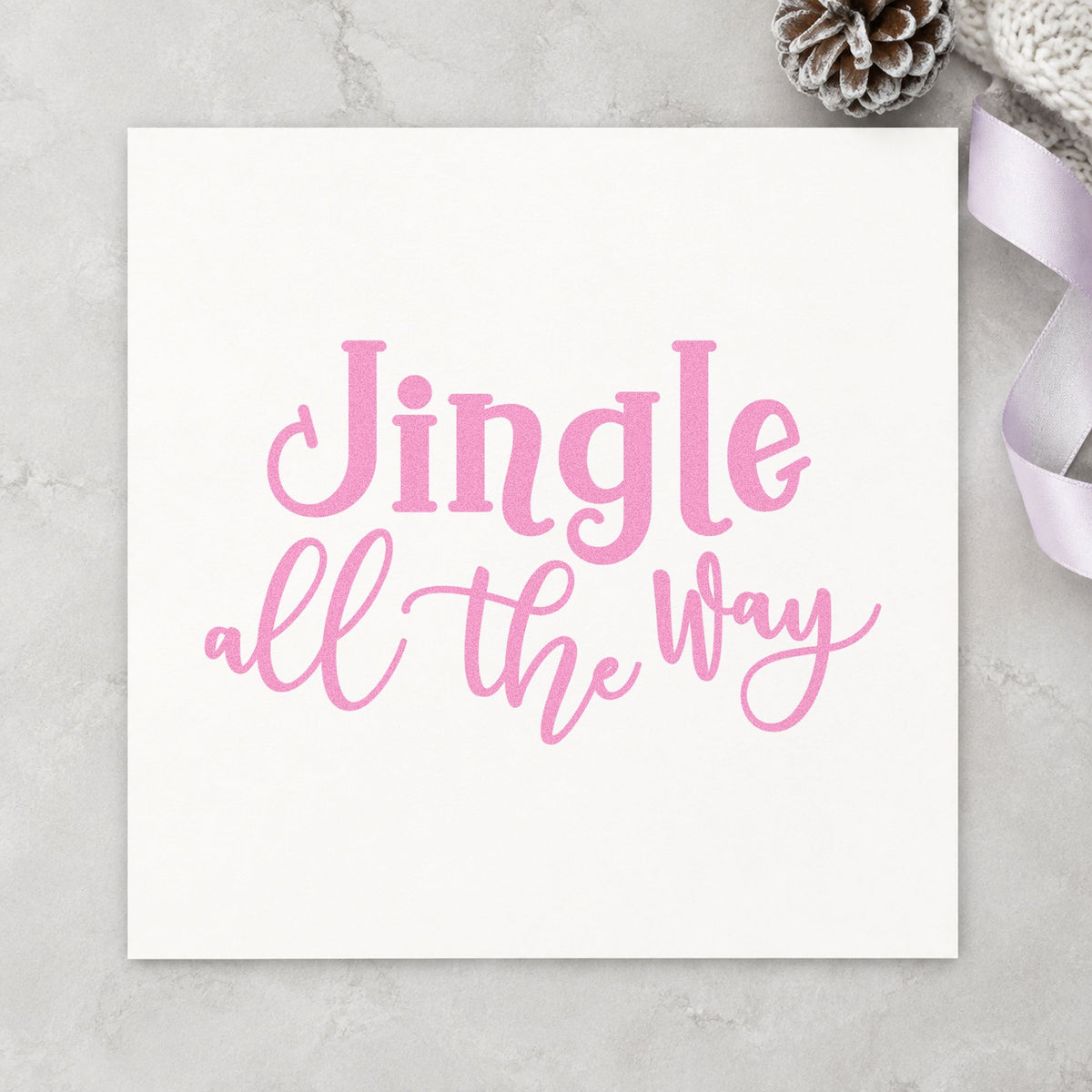 Jingle All The Way Script craft stamp in purple ink on cardstock, an easy option for bell craft album page.