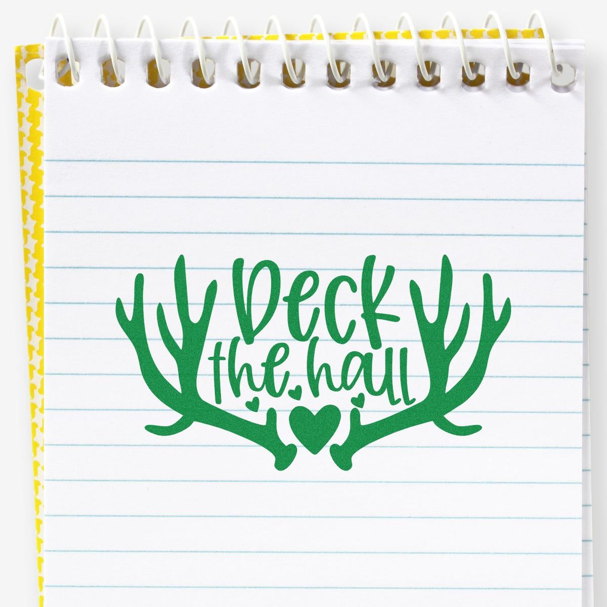 Deck The Hall Antlers rubber stamp shown in green ink, stamped for projects such as hallway album page.