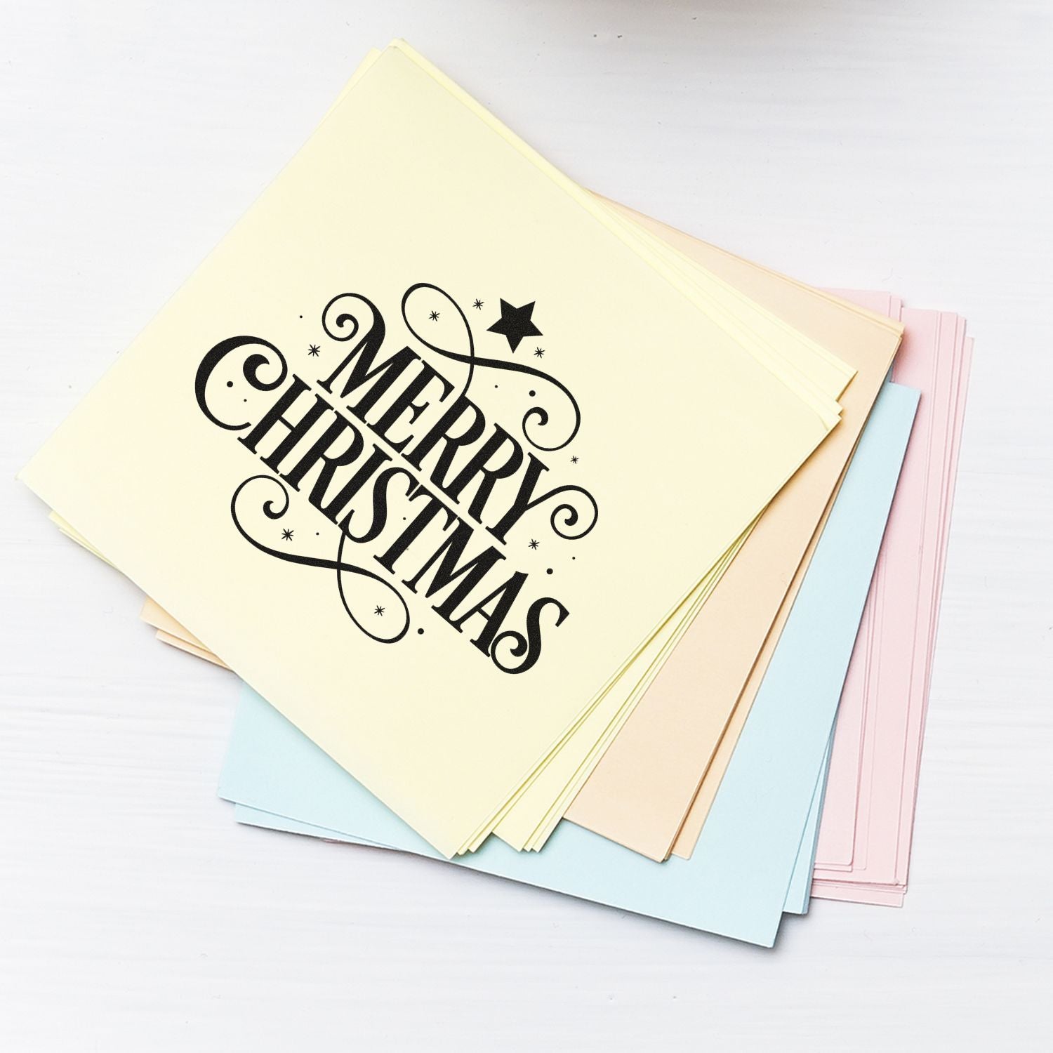 Custom Merry Christmas rubber stamp on pastel greeting cards for holiday card making