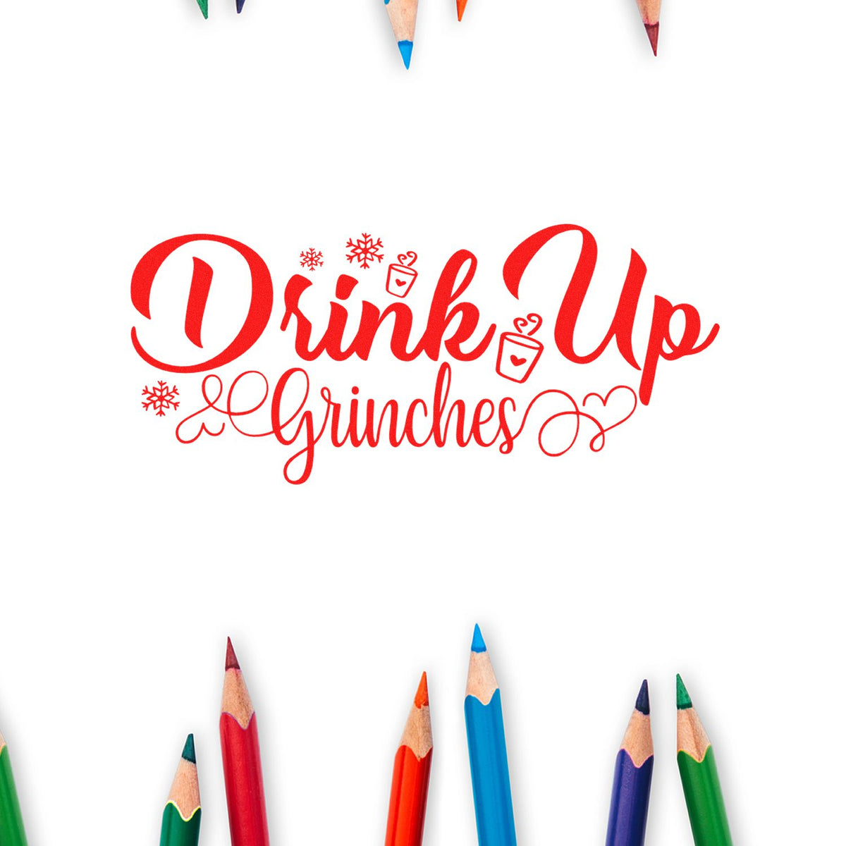Holiday rubber stamp design reading Drink Up Grinches with snowflakes and cocoa mugs, framed by colorful pencils.