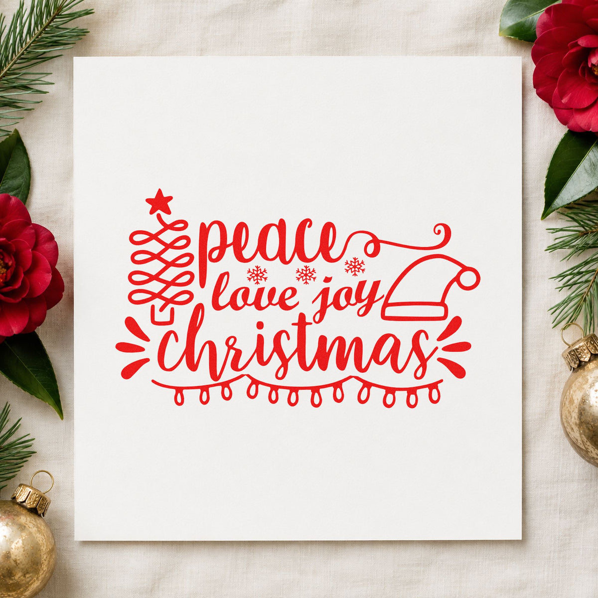 Peace Love Joy Christmas craft stamp in red ink on cardstock, an easy option for duvet cover printing.