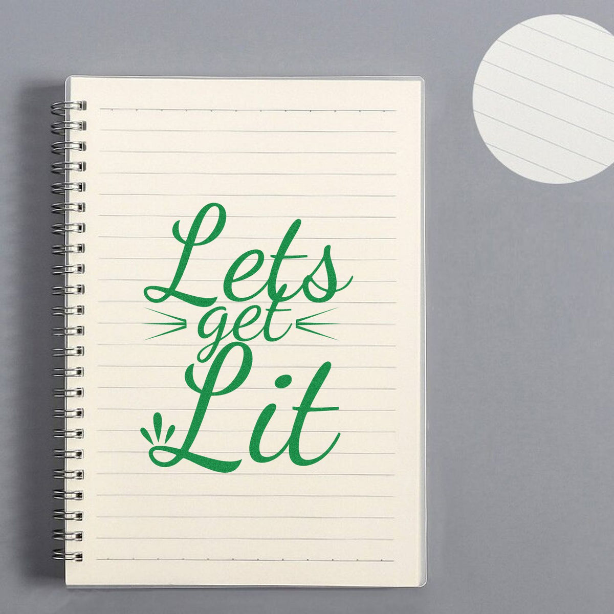 Lets Get Lit green rubber stamp design mockup on lined notebook, perfect for party invitations, planners, and craft projects.