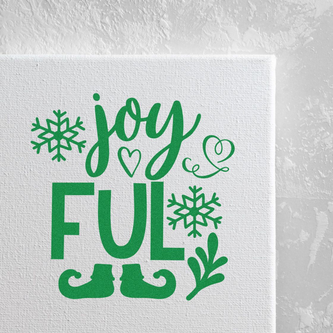 Green holiday rubber stamp design reading joyFUL with snowflakes, heart, and festive decorative accents.