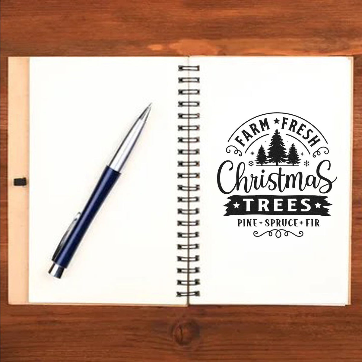 Farm Fresh Christmas Trees rubber stamp impression on notebook page, featuring pine, spruce and fir for holiday crafts.