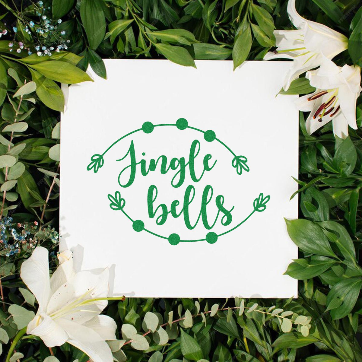Jingle Bells Christmas rubber stamp design with green script and leafy floral wreath border on white background.