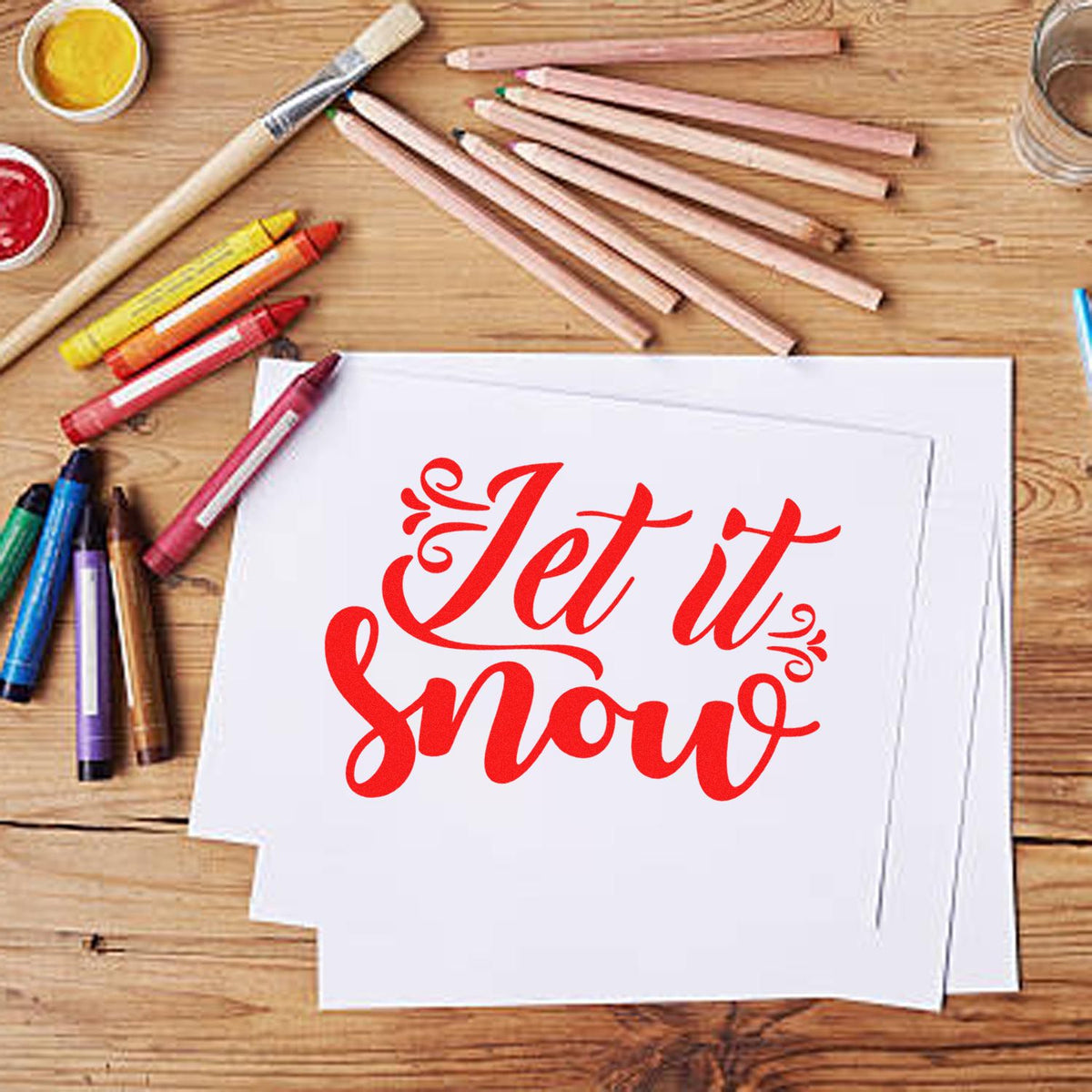 Let It Snow Ornate Script rubber stamp shown in red ink, stamped for projects such as snow day album page.