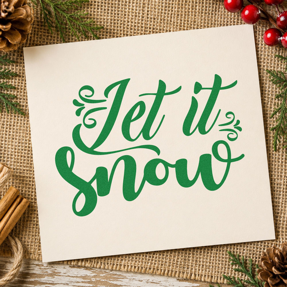 Let It Snow Ornate Script craft stamp imprinted in green ink on paper, a design suited to framed mudroom bench.