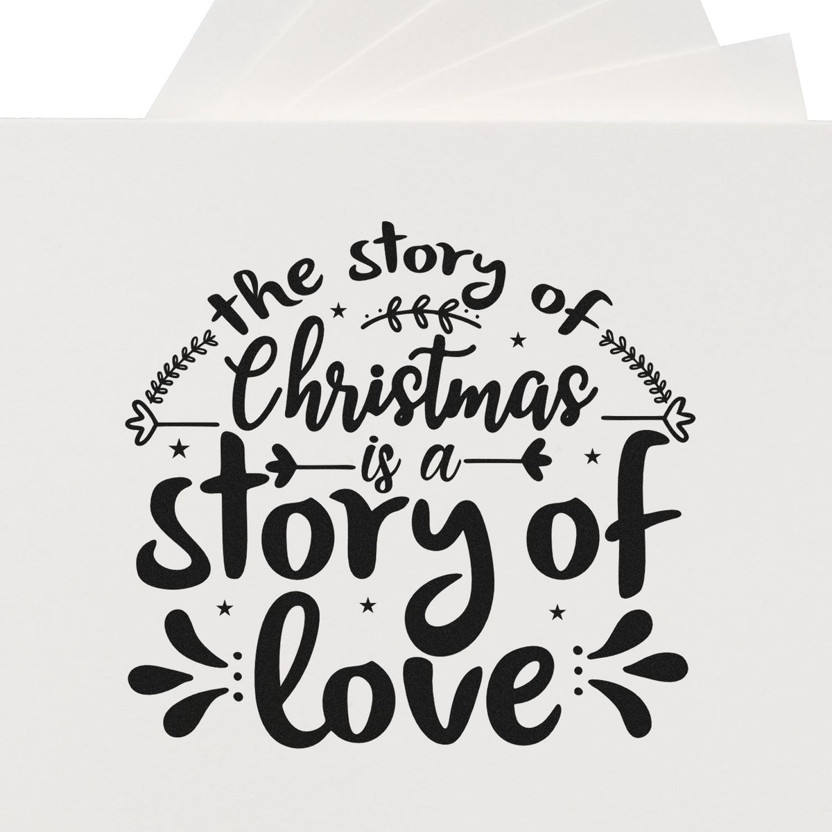 Christmas Story Of Love Pre-Inked Stamp – Slim imprint stamped in black ink. “The Story of Christmas Is a Story of Love” appears with leafy sprigs, stars, and accent rays.