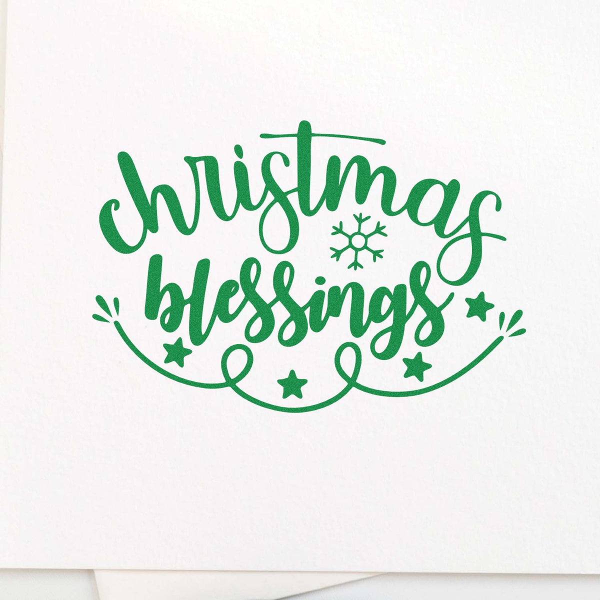 Christmas Blessings rubber stamp design in green script with snowflake and stars for holiday cards and crafts.