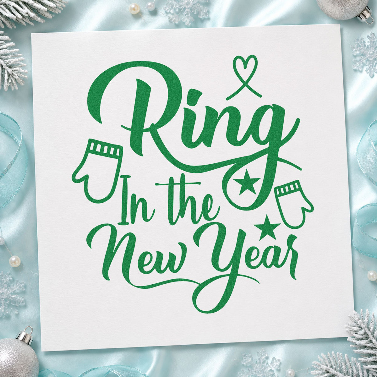 Ring In The New Year craft stamp imprint in green ink on a handmade project, one idea being bonfire party invites.