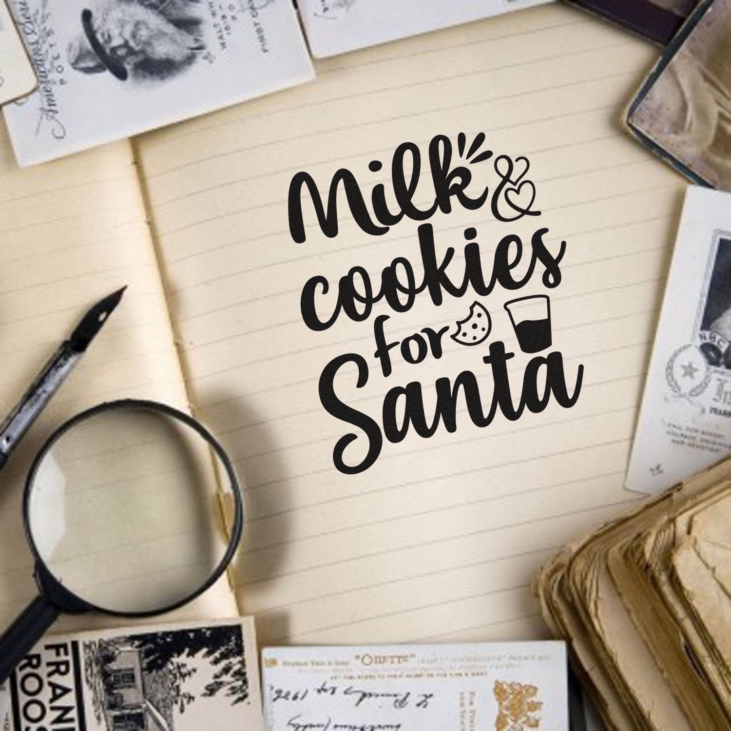 Christmas milk and cookies for Santa rubber stamp design on notebook, with vintage stationery and holiday ephemera.
