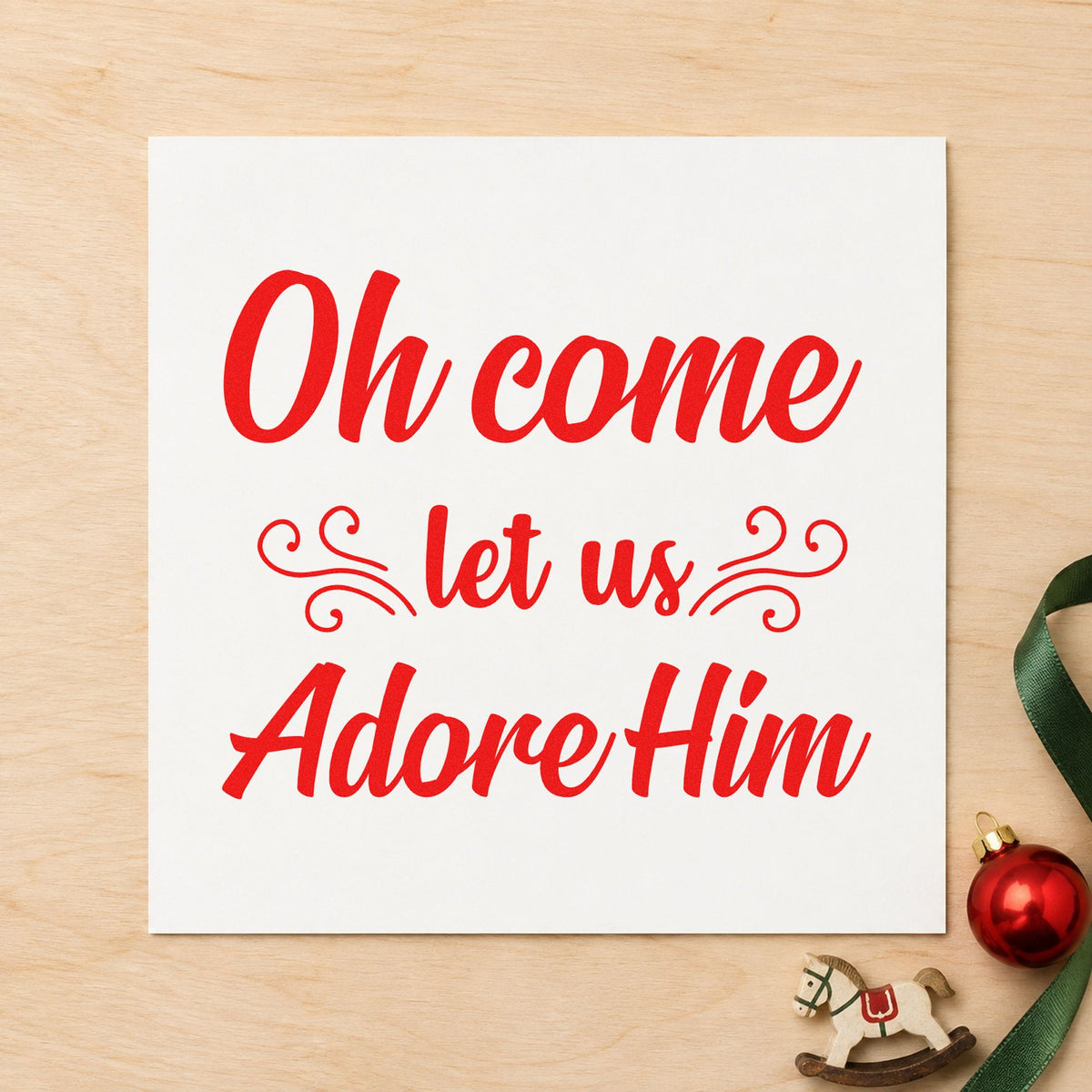 Oh Come Let Us Adore Him rubber stamp shown in red ink, stamped for projects such as cable case labels.