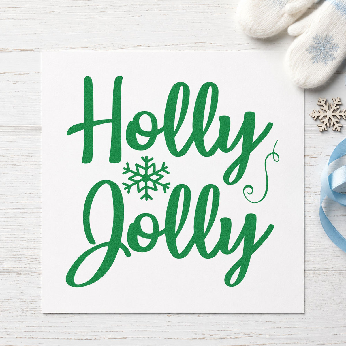 Holly Jolly Snowflake craft stamp imprint in green ink on a handmade project, one idea being menu course rules.
