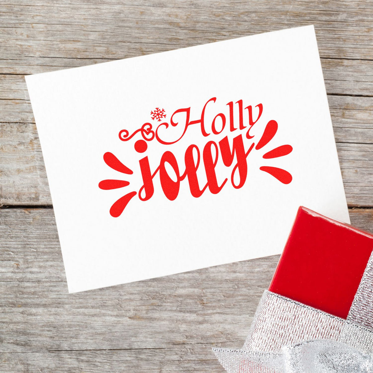 Holly Jolly Christmas rubber stamp design in red on card, perfect for festive holiday card making.