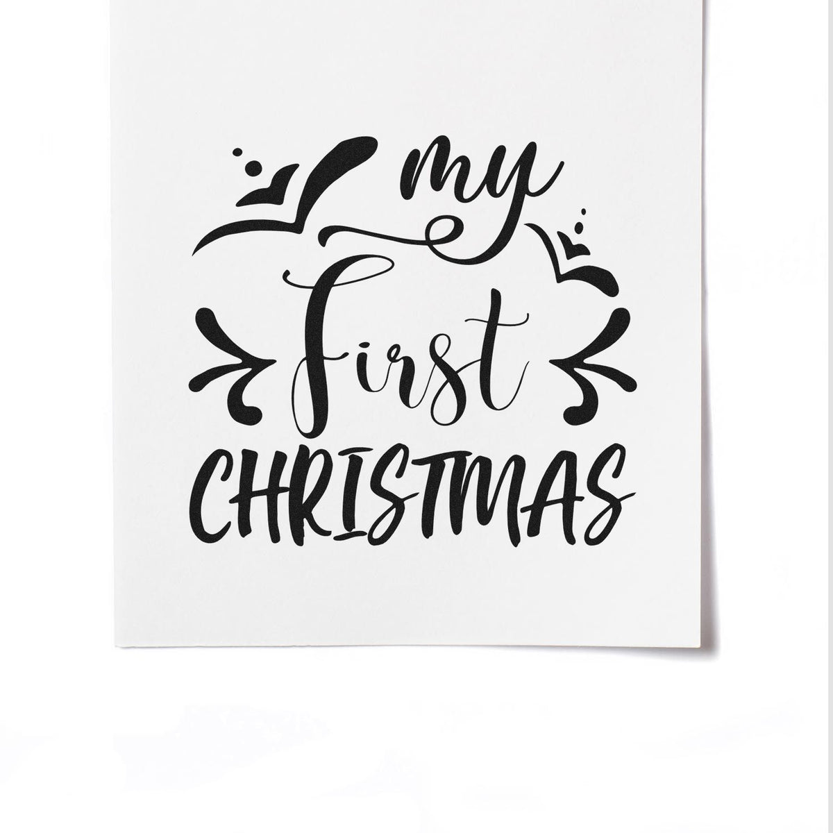 My First Christmas rubber stamp design in black calligraphy for holiday cards, babys first Christmas crafts, and gift tags.