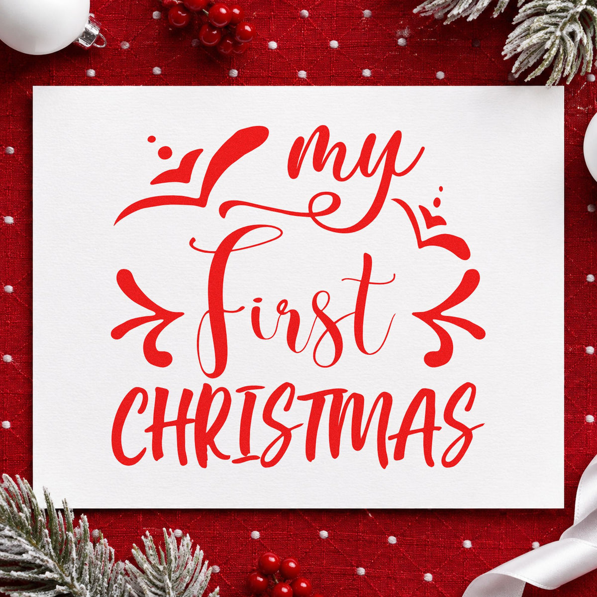 My First Christmas rubber stamp shown in red ink, stamped for projects such as keepsake case labels.