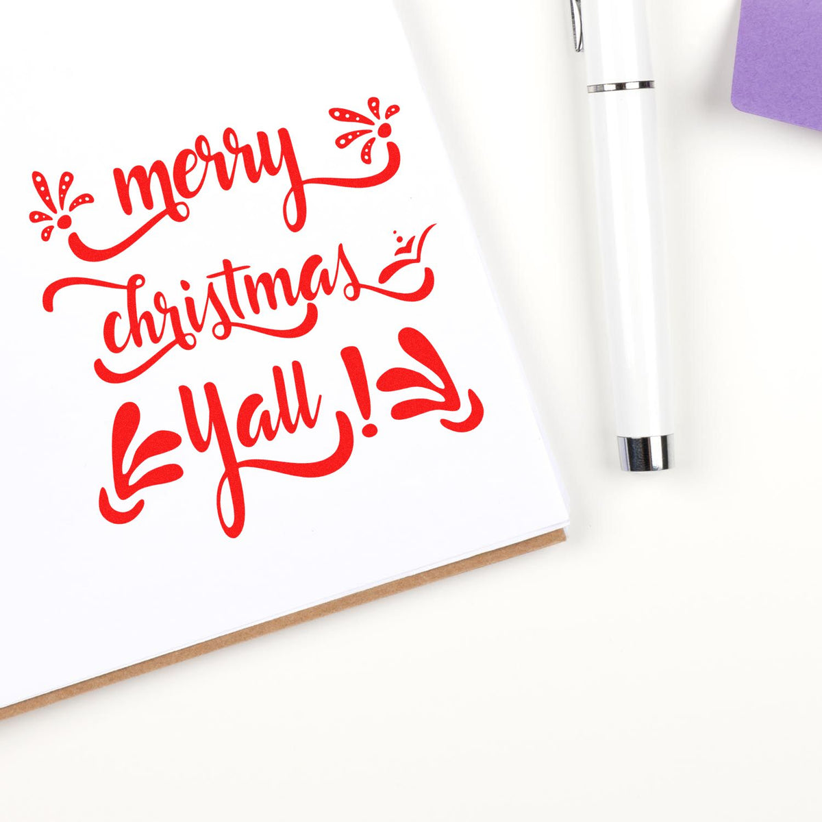 Christmas rubber stamp design with red Merry Christmas yall lettering for holiday cards and crafts.