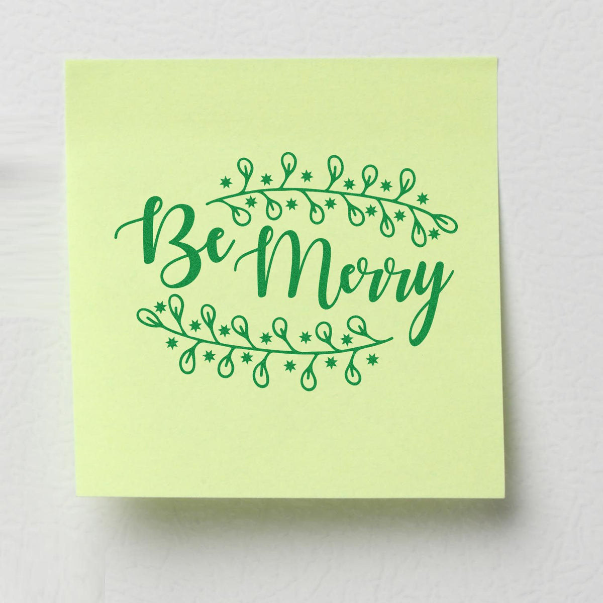 Be Merry holiday rubber stamp design with festive string lights on pastel green paper