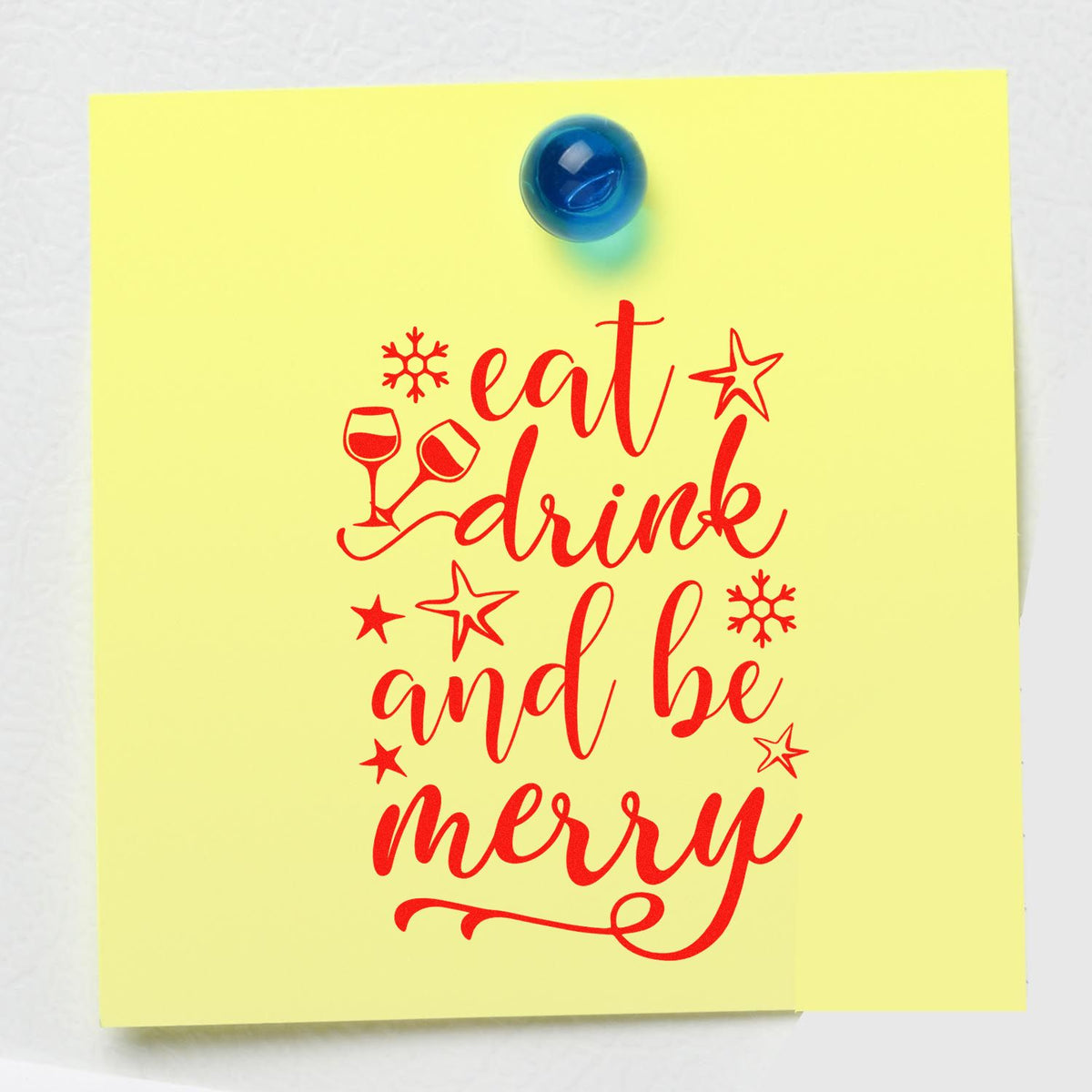 Festive rubber stamp design reading eat, drink and be merry with wine glasses, stars and snowflakes for holiday cards.