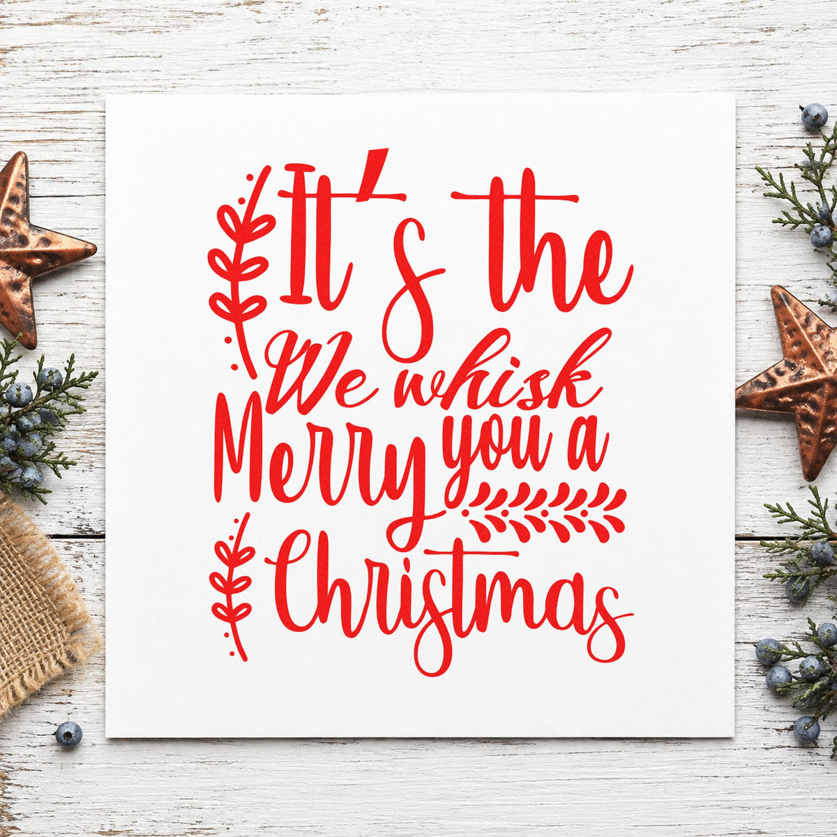 We Whisk Merry Christmas craft stamp in red ink on cardstock, an easy option for flour towel printing.