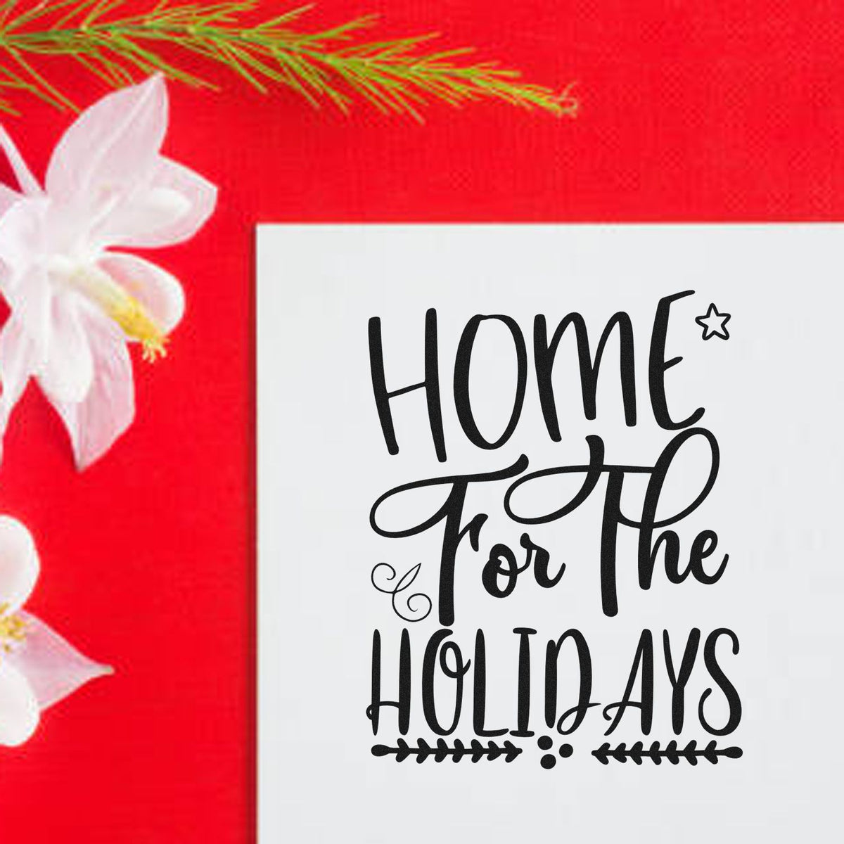 Home For The Holidays Premium Wood-Mounted Stamp - Vintage Pro imprint stamped in black ink. "Home for the Holidays" features a star, curls, dots, and leafy underline.