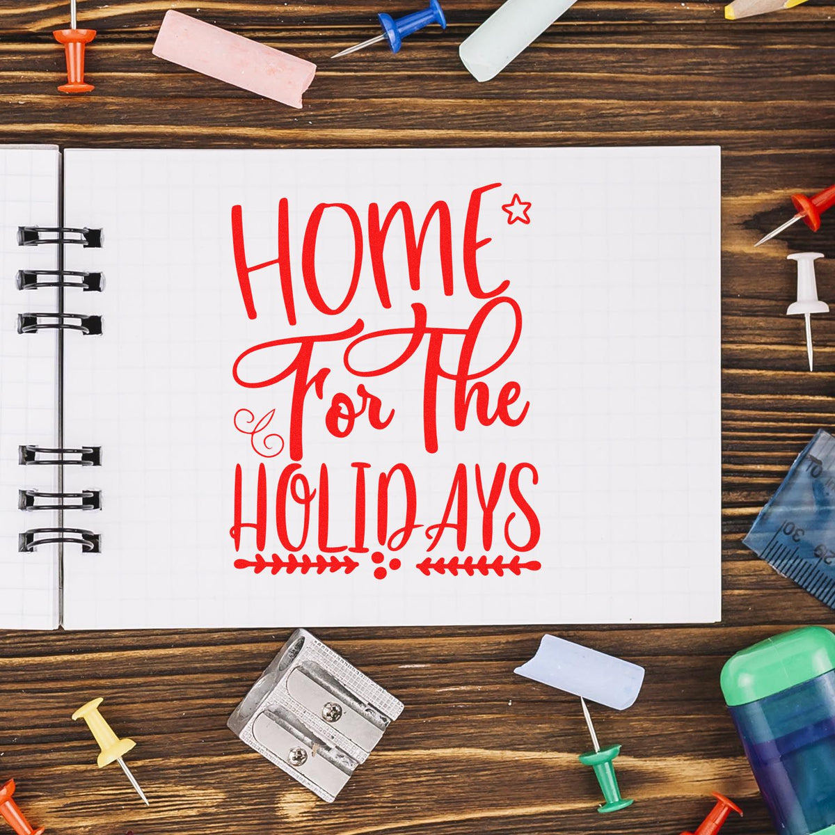 Home for the Holidays rubber stamp design in red script, ideal for Christmas card making and festive paper crafting.