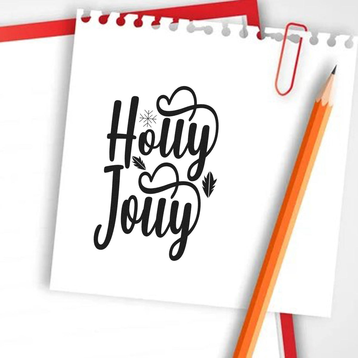 Holly Jolly rubber stamp design for holiday cards, featuring festive hand-lettered text with hearts and leaves.