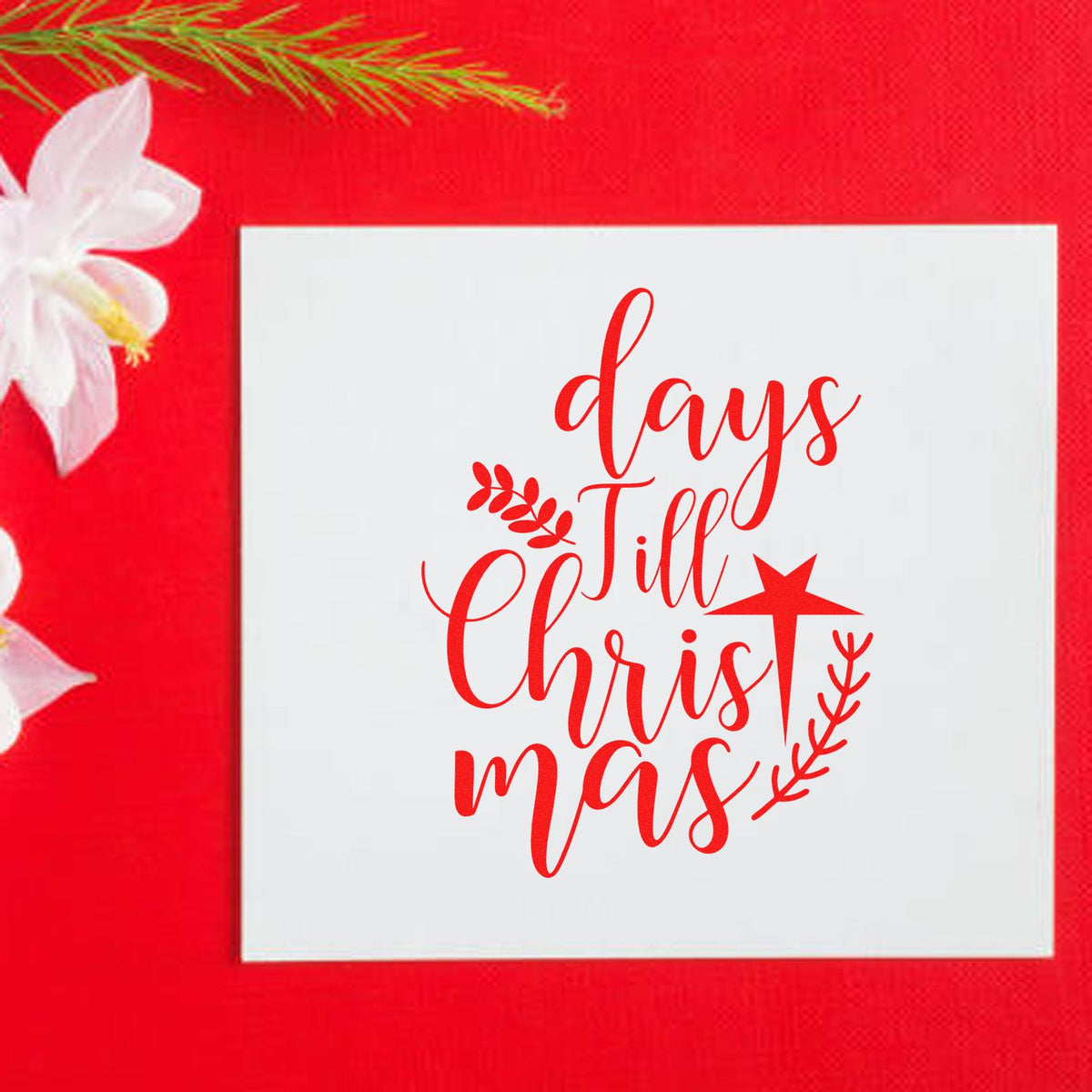 Christmas countdown rubber stamp design with days till Christmas in red script on a white card.