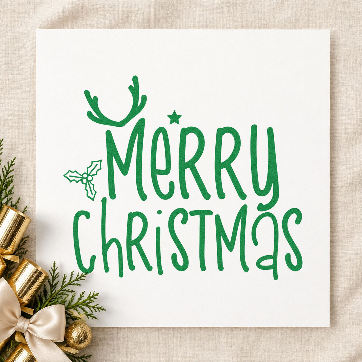 Merry Christmas Antlers Holly craft stamp imprinted in green ink on paper, a design suited to framed small shelf.