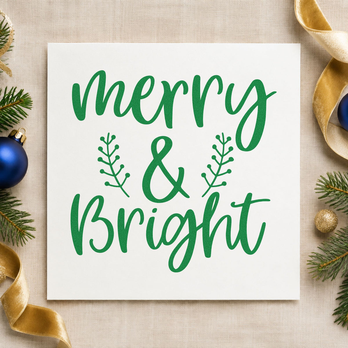 Merry And Bright Leafy Sprigs craft stamp imprint in green ink on a handmade project, one idea being double table cards.