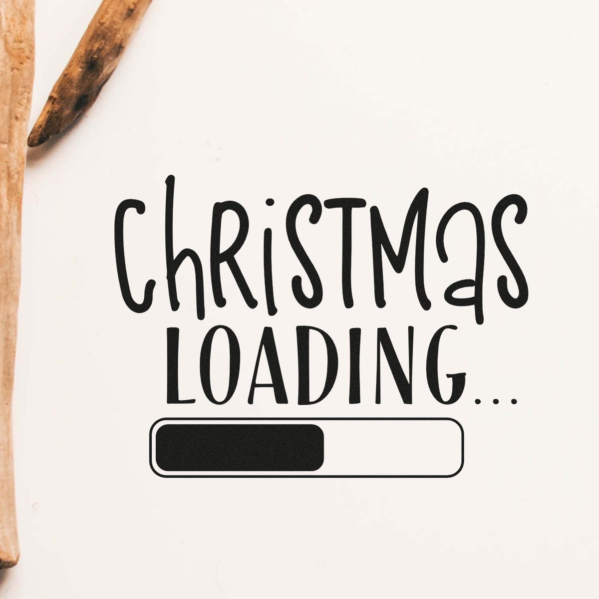 Christmas Loading Progress Bar Slim Pre-Inked Stamp imprint stamped in black ink. “Christmas Loading...” appears above a partly filled progress bar.
