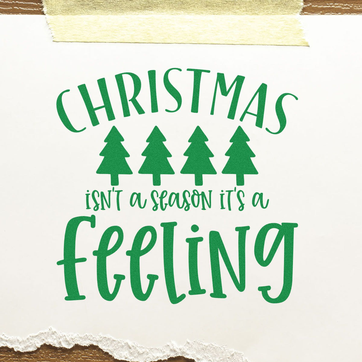 Christmas rubber stamp design with festive trees and quote, Christmas isnt a season, its a feeling.