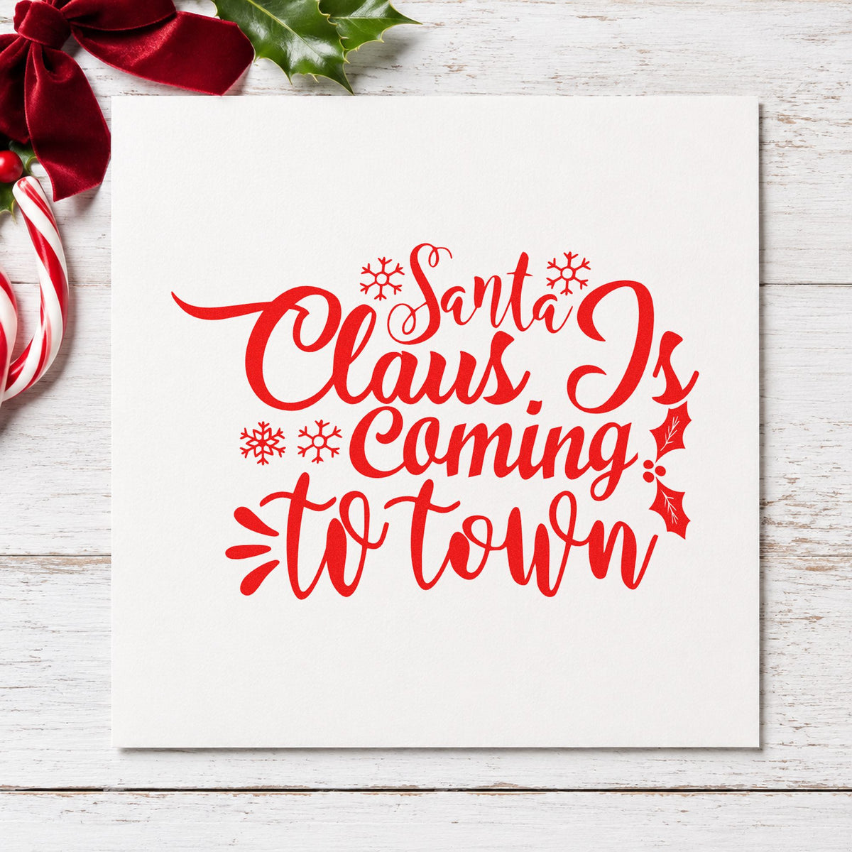 Santa Claus Coming To Town rubber stamp shown in red ink, stamped for projects such as candy crate labels.
