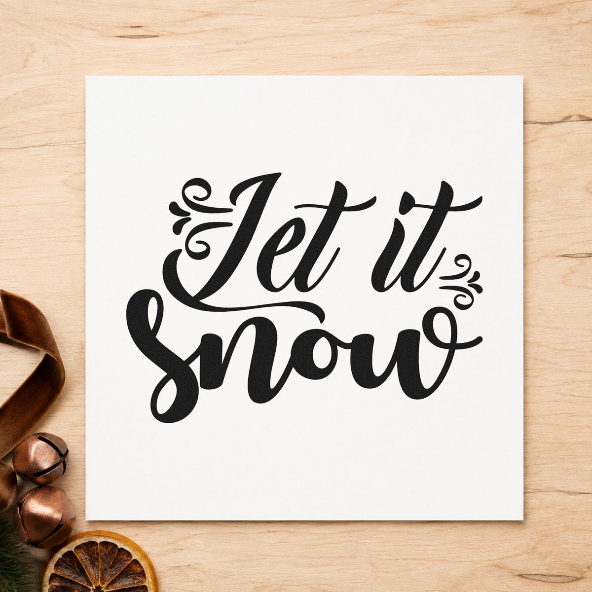 Let It Snow Decorative Script rubber stamp printed in black ink, ready for twin curls cards and similar paper crafts.