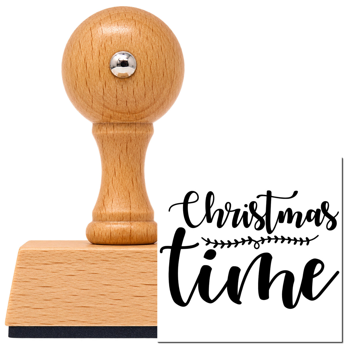 Leaf-Divided Christmas Time Lettering Vintage Pro rubber stamp in European beech wood with a round knob handle, shown beside its black imprint.