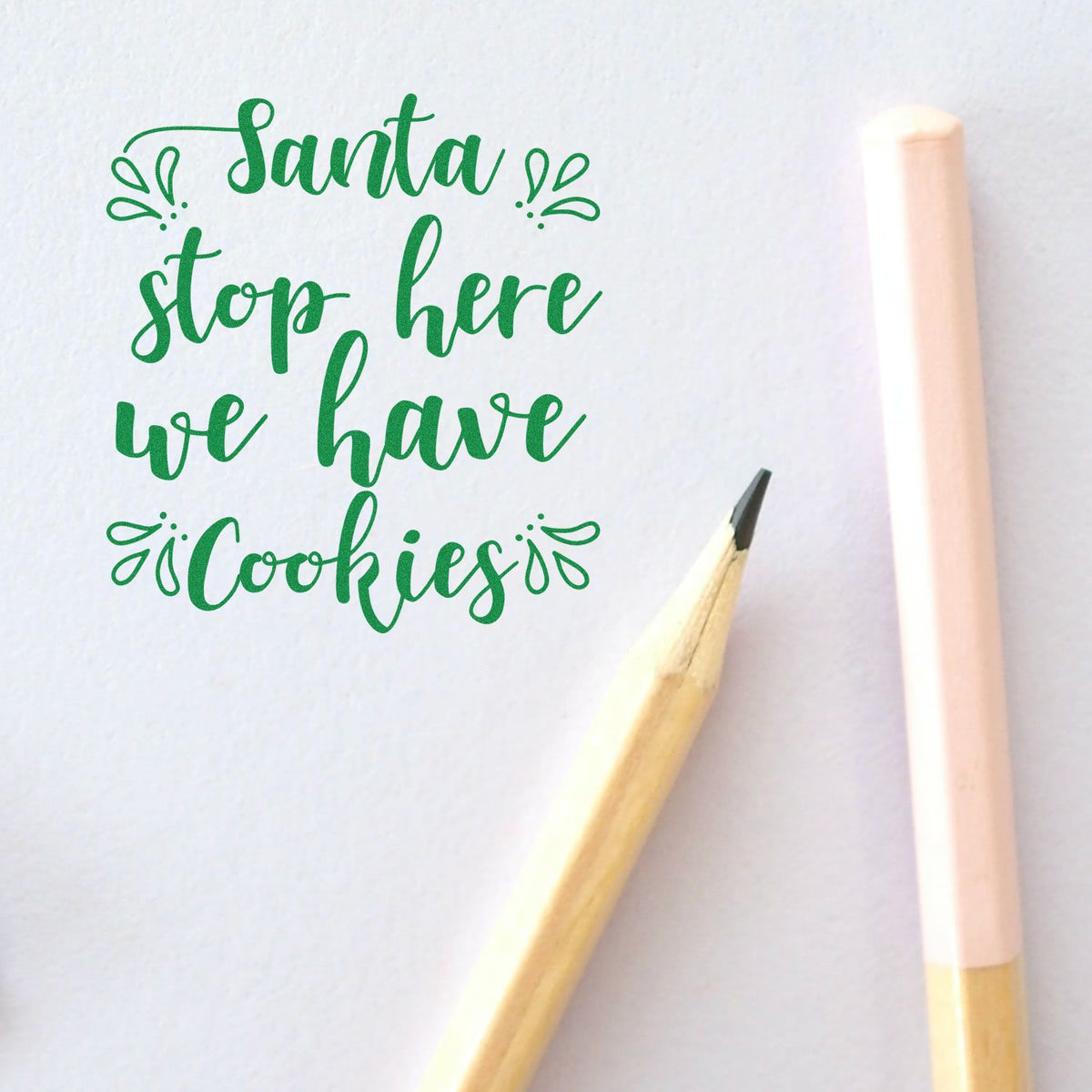 Santa Stop Here Cookies rubber stamp shown in green ink, stamped for projects such as yard decor album.