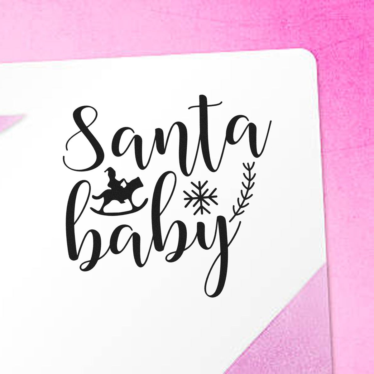 Santa Baby Christmas rubber stamp design with script lettering, rocking horse, and snowflake for holiday crafts