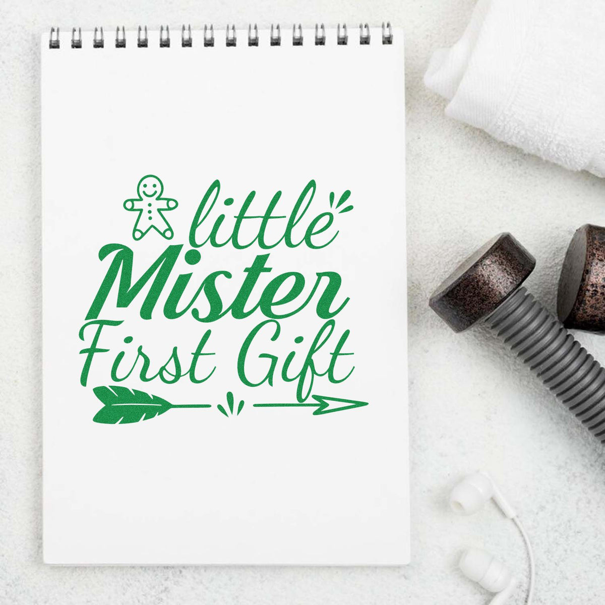 Little Mister First Gift rubber stamp shown in green ink, stamped for projects such as opening album page.