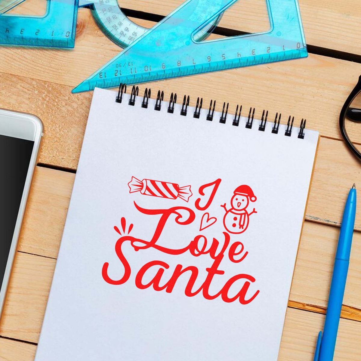 Christmas rubber stamp design with Love Santa lettering, candy, and snowman for holiday cards and crafts.