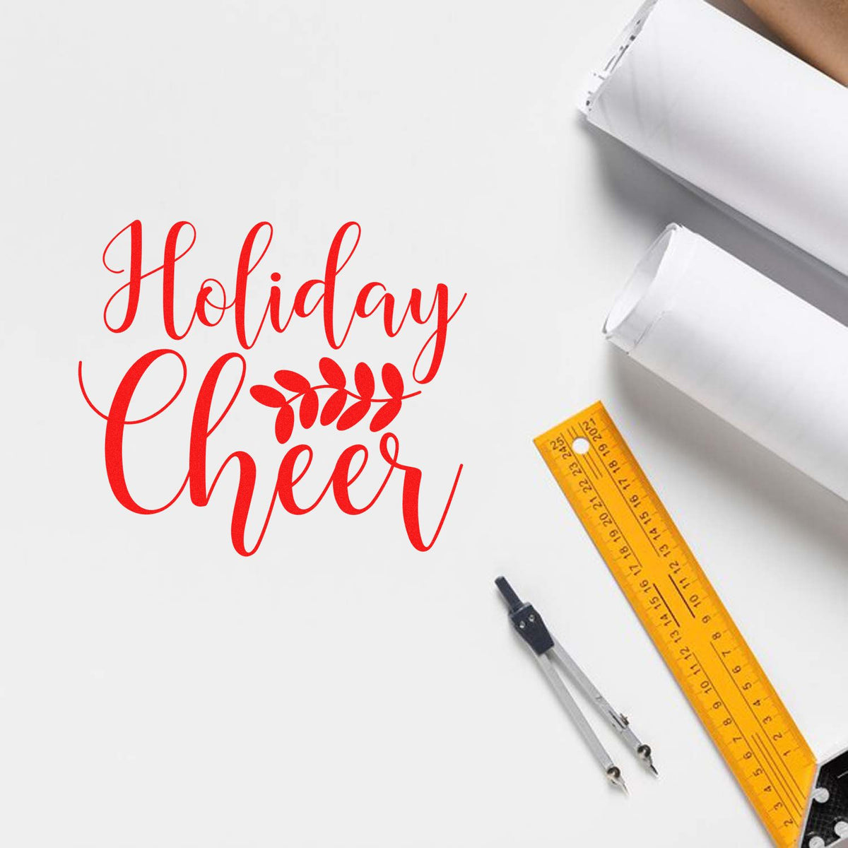 Holiday Cheer rubber stamp design mockup for festive cards, gift tags, and holiday packaging.