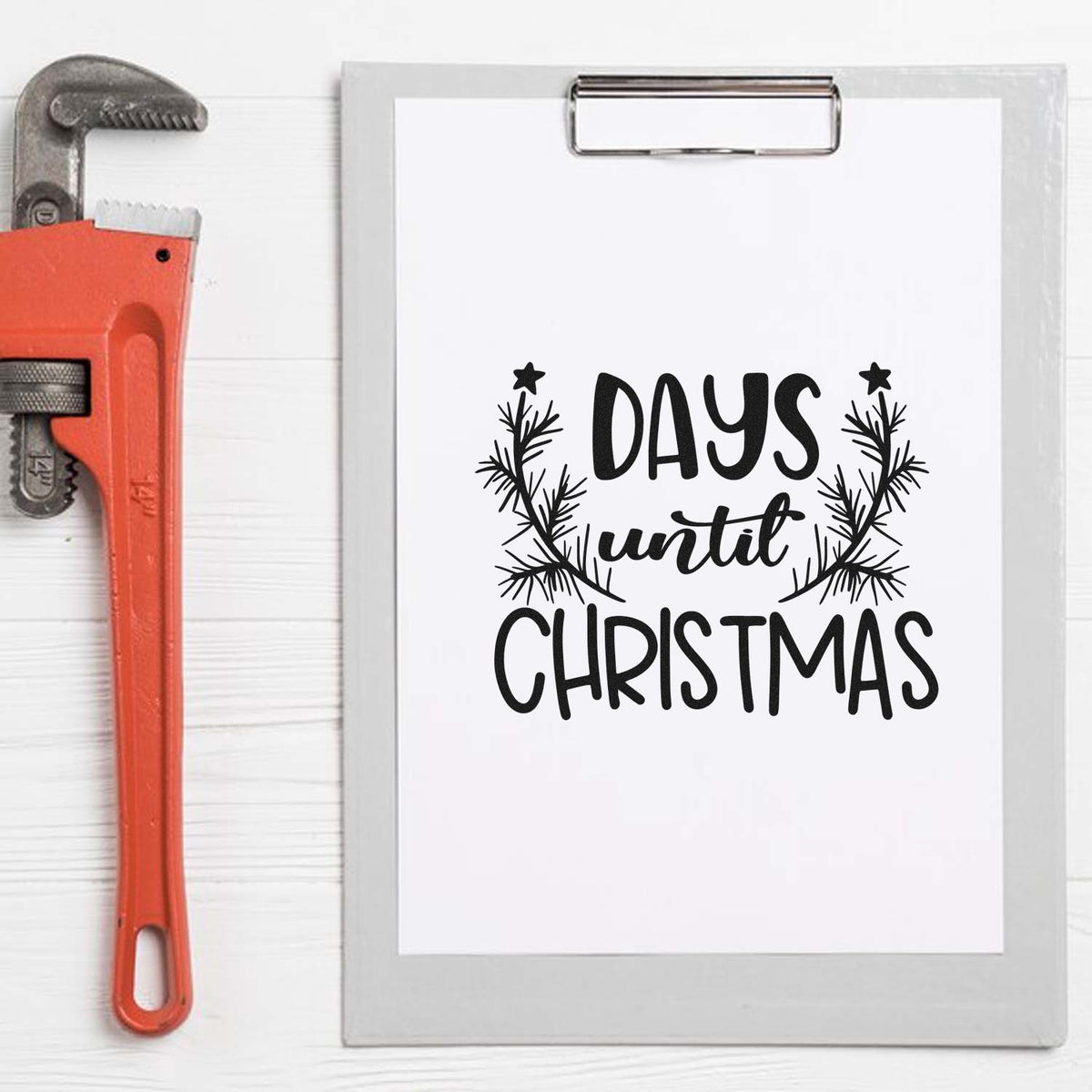 Christmas countdown rubber stamp design reading Days Until Christmas with wreath on clipboard for holiday crafting.
