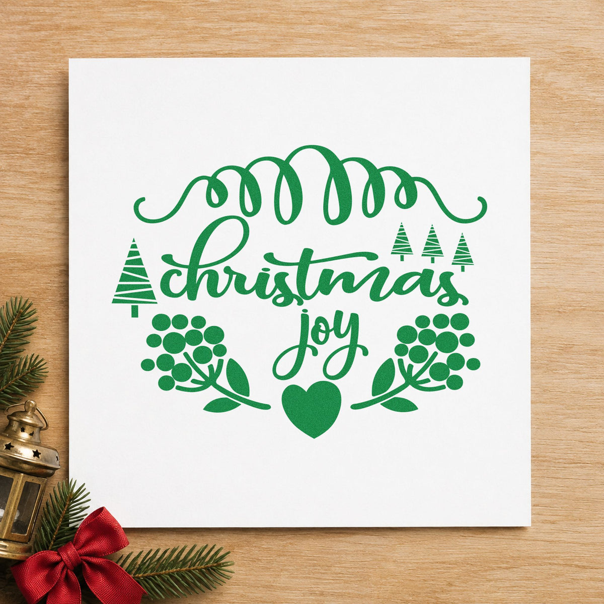 Christmas Joy Berry Frame craft stamp imprint in green ink on a handmade project, one idea being berry bundle tags.